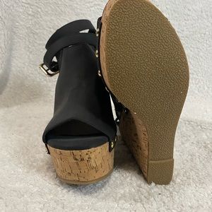JustFab size 9 wrap around wedge. Never worn, do not have original box.